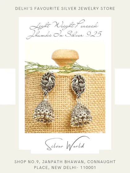 Our lightweight peacock jhumkis are a customer favorite. Crafted in pure 92.5 silver, they feature a detailed peacock stud and a classic jhumka bell, perfect for comfortable, all-day wear.