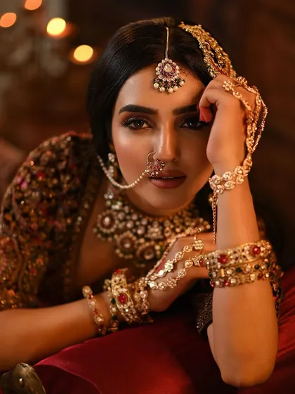 A final, powerful close-up of this stunning, high-fashion bridal look.