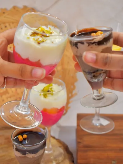 Cheers to dessert. Here are two of my popular layered glass desserts: a fruity, tropical delight and a rich Mudslide Brownie parfait.