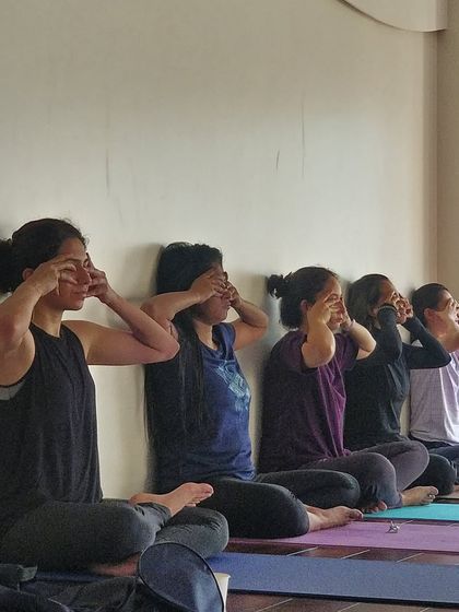 A moment of collective stillness as we practice Bhramari (Humming Bee Breath), a pranayama technique that soothes the nervous system.