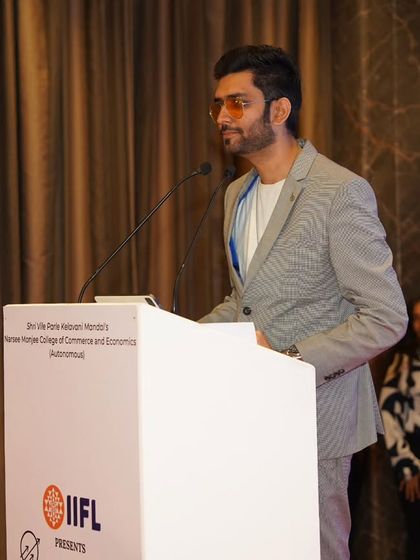 At the podium for the Global Youth Economic Summit. I am equally comfortable hosting youth-centric events and high-level business conferences, adapting my style accordingly.