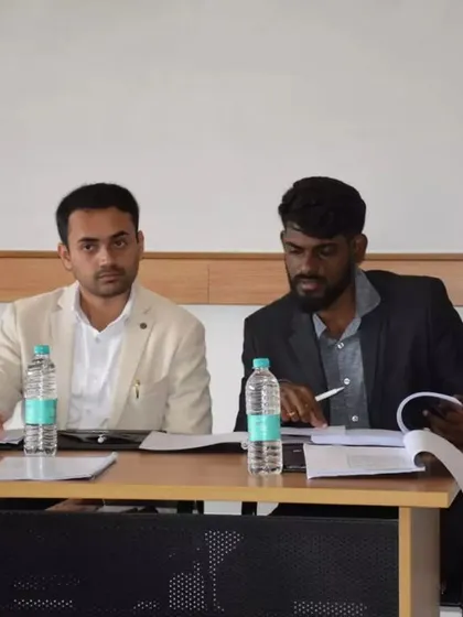 Serving as a judge in a moot court competition, carefully evaluating the arguments of law students. This experience keeps my own skills sharp and connected to legal education.