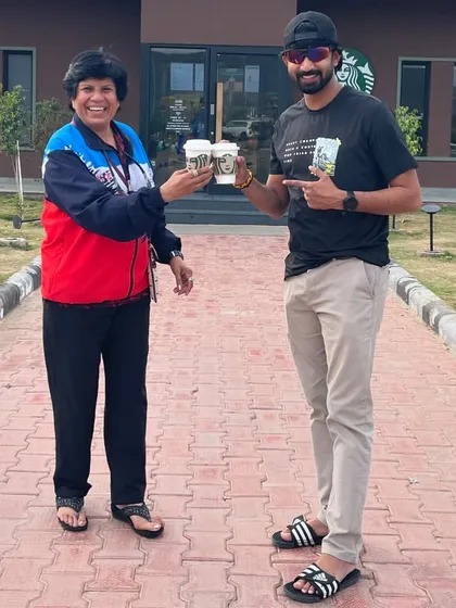 Sharing a coffee with a fellow coach. "Regret cannot change the past, and worry cannot fix the future." We believe in living in the present and enjoying the journey.