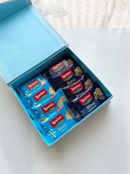 The inside of the baby announcement box, filled with an assortment of Loacker Minis. A simple, sweet, and delicious way to share the news.