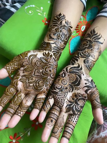 Another angle of the floral Eid design, showing the details against a vibrant green background.