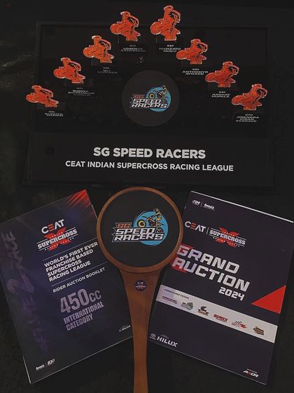 The auction paddle and rider booklet for the SG Speed Racers team. We create all the custom materials needed for a professional and seamless auction.