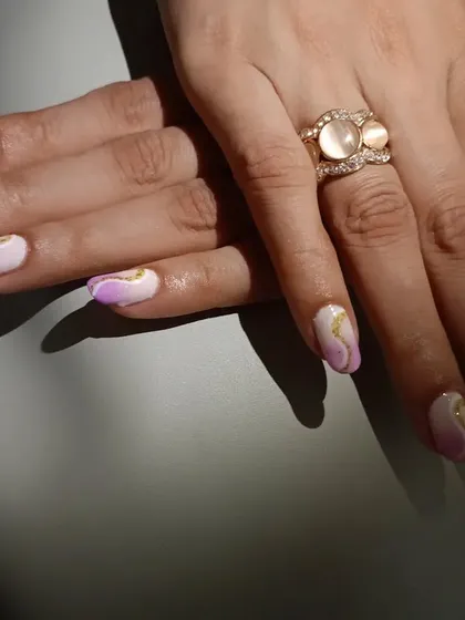 A lovely lavender and white ombre set with delicate gold swirls for an added touch of elegance.