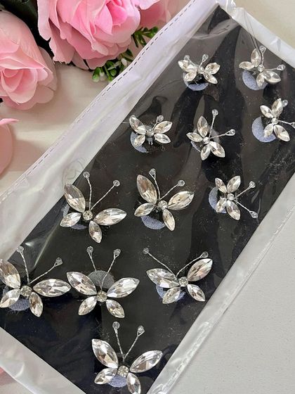The silver stone butterfly clips are so versatile and add a cool, glamorous touch to any hairstyle.