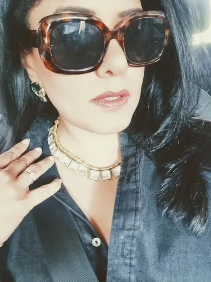 This polki-cut necklace is one of my favourite pieces. The uncut diamonds have a unique charm, and I paired it with a simple black linen dress to let it stand out.
