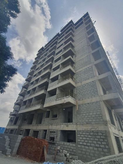 This angle shows the side of the building, highlighting the depth and dimension of the structure even in its unfinished state.