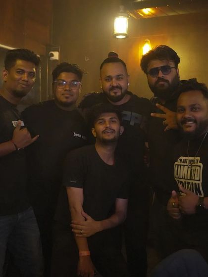 A group photo with the crew and fellow DJs. The nightlife industry is built on teamwork and collaboration.
