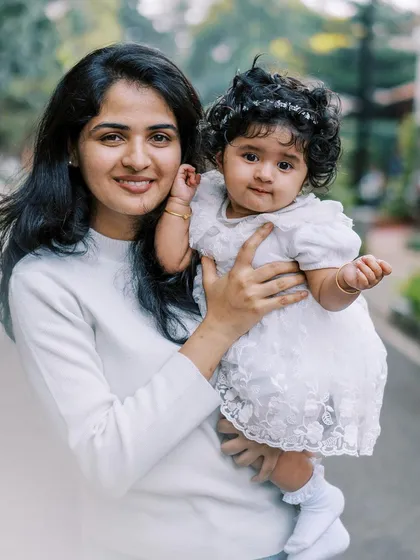A sweet portrait of a little girl with her favorite auntie, showing the special bonds within the extended family.