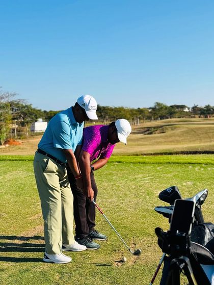 Our coaches are constantly on the range, providing hands-on instruction. From demonstrating a swing path to analyzing a student's setup, these moments of direct mentorship are where real progress is made.