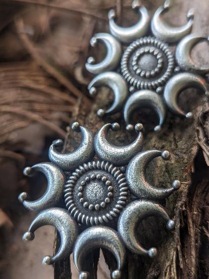 I love you to the moon and back. These black polish ear studs with a crescent moon design are a perfect gift for someone you love, or for any moon lover.