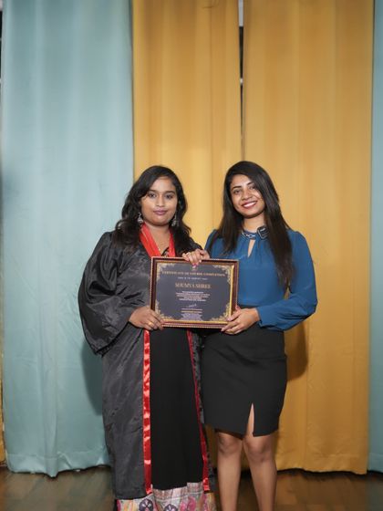 Another successful student from Probatch 28 receiving her certificate.