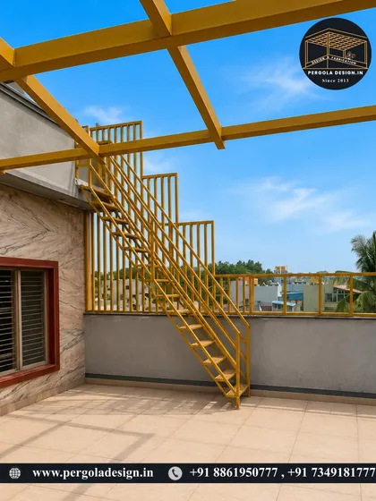 The project is taking shape. The vibrant yellow powder-coated steel frame and staircase are now installed, adding a bold design element to the rooftop space.