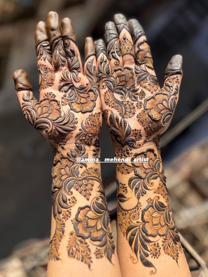 A close-up view of a floral vine design. This style is perfect for creating an elegant, flowing look up the arm.