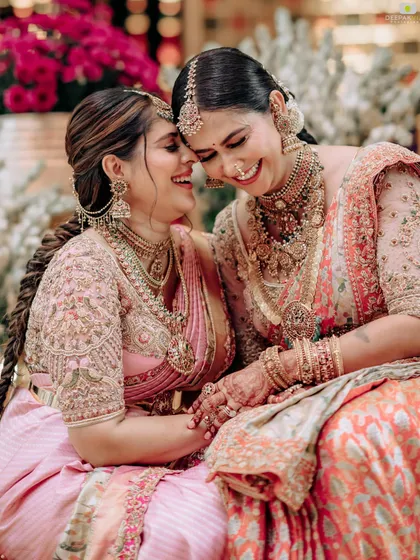 The best part of my work is sharing it with the people I love. A candid moment with my sister, both of us in custom sarees, celebrating a family function. It’s these connections that are woven into the fabric of my brand.