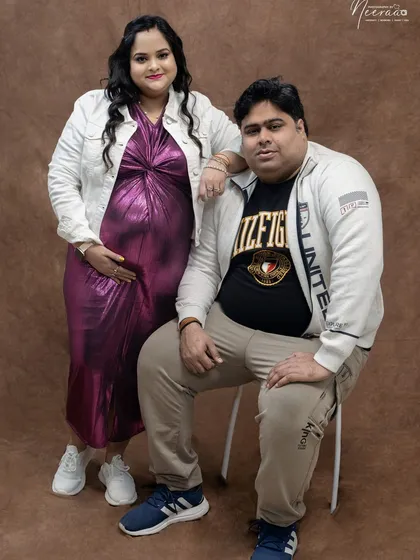 A confident and relaxed portrait of the expecting couple. Their coordinated casual outfits give the session a laid back feel, proving that you don't always need a gown to have a beautiful maternity shoot.