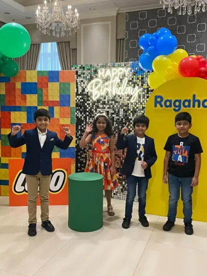 The birthday boy and his friends enjoying the LEGO-themed photo booth. I love creating spaces where kids can feel like the heroes of the party.