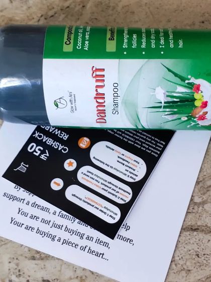 A close up of my Dandruff Shampoo before it gets packed. You can see the promise on the label: strengthen follicles, reduce dryness and itchiness, and promote healthy hair.