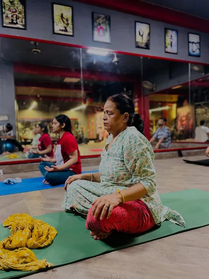 An older student demonstrating that peace and stillness can be cultivated at any stage of life.