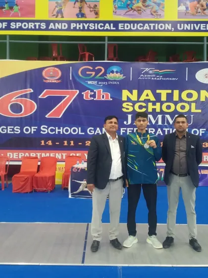 A proud moment for our fencer and coaches at the 67th National School Games in Jammu. Standing before the official banner, this image captures the essence of national level competition.