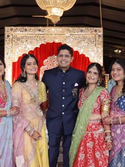 A lovely family portrait from a wedding event. We had the pleasure of designing colorful, coordinated lehengas for the women, each featuring unique embroidery and detailing.