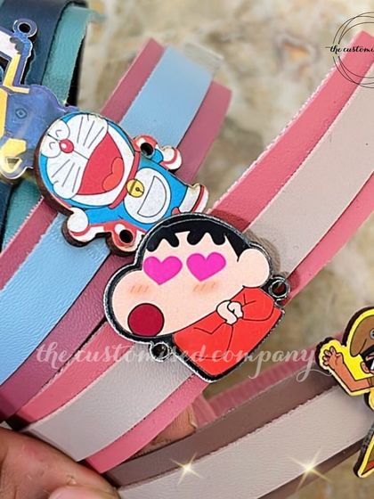 Make Rakhi extra fun for the little ones with these adorable cartoon charm rakhis. Featuring characters like Doraemon, Shinchan, and Minions, these are sure to be a hit with your younger brother.