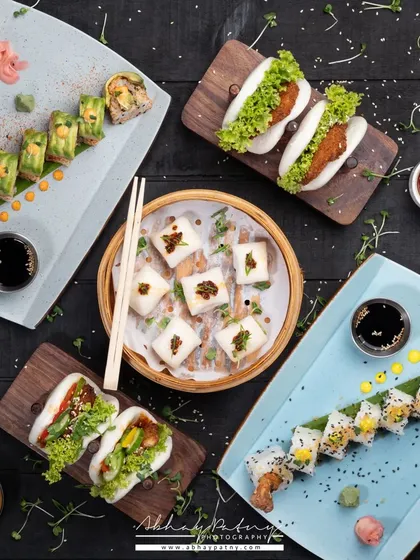 A great menu photo should tell a story of variety and abundance. For this Asian food spread, I carefully arranged each dish, from sushi to bao, to create a balanced and visually exciting composition. This kind of top-down shot is perfect for showcasing a restaurant's diverse offerings.