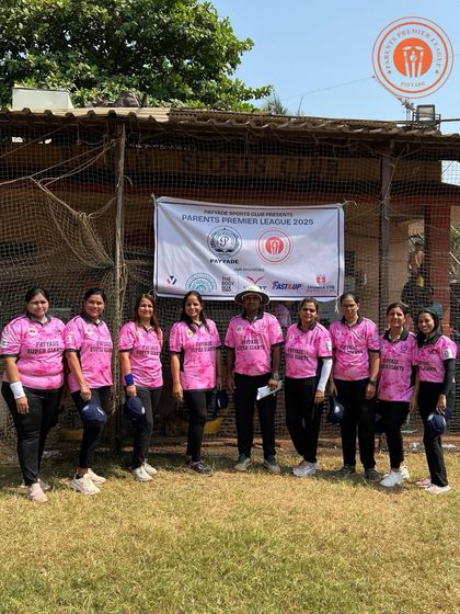 A women's team in bright pink jerseys stands together for a team photo during the PPL.