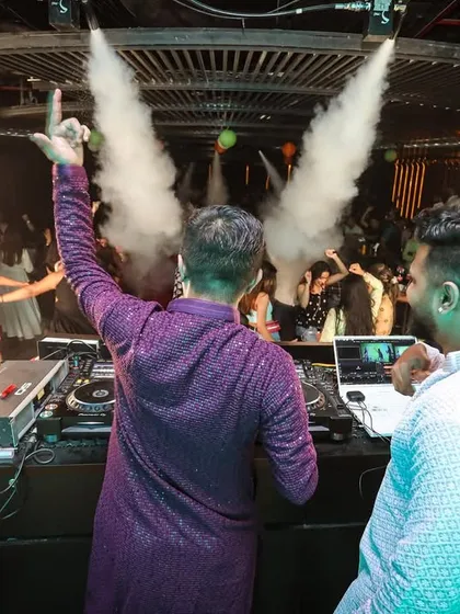 I love adding production value to my sets. Here you can see CO2 cannons and sparklers going off, turning a great night into an epic one. These are the moments that make an event unforgettable.