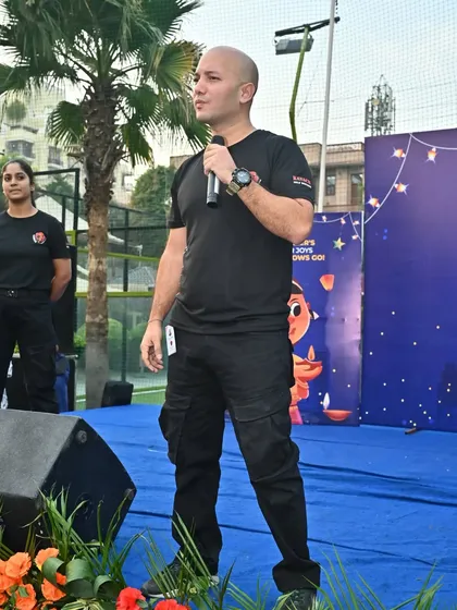 A picture of me addressing an audience during a self defense presentation. Leading the Kavach team requires setting the standard for strength and professionalism.