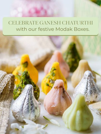 Celebrate Ganesh Chaturthi with my festive Modak Boxes. This image displays a variety of my handcrafted modaks, including some with delicate silver vark, ready for the festivities.