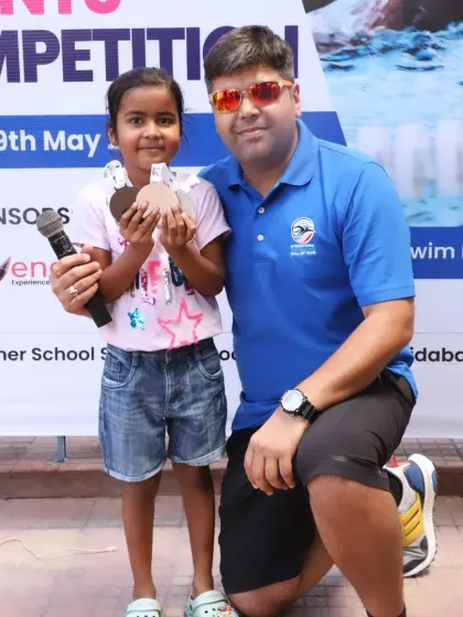 A moment with one of our youngest medal winners. I am here to support every swimmer, at every age and every level.