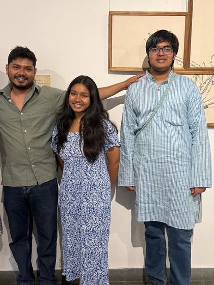 The artist Mohit Mahato posing with friends and supporters at the opening of his exhibition.