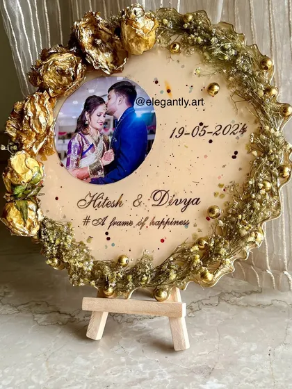 Another look at the elegant flower photo frame, showing the full design with the stand. It's a perfect way to preserve the magic of a wedding day.