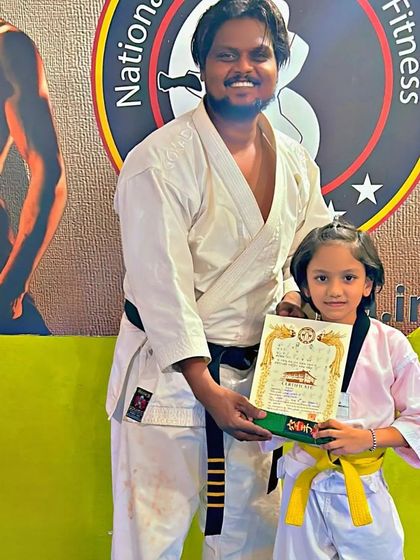 National Martial Arts and Fitness Academy - Kids Martial Arts & Fitness The Journey of Discipline: Belt Graduations photo 18