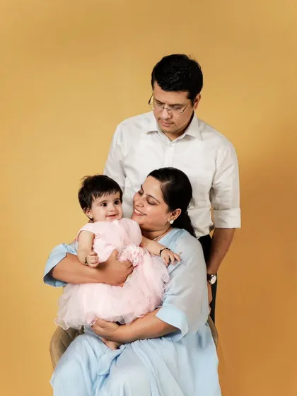 A quiet, loving moment between parents and their baby girl. We create a relaxed atmosphere so these genuine emotions can shine through.