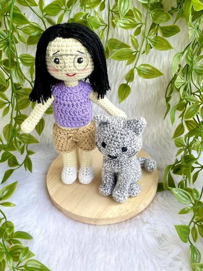 Another beautiful replica of a girl and her cat. I love how the purple top and shorts came out. These custom dolls make such personal and cherished gifts for any occasion.