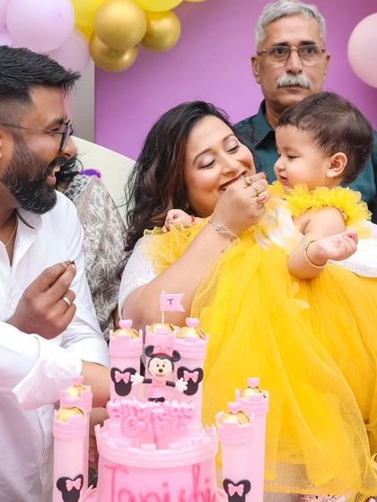 A magical 'Unicorn' themed birthday party, with pastel colors, shimmering backdrops, and unicorn illustrations, creating a whimsical and dreamy atmosphere.