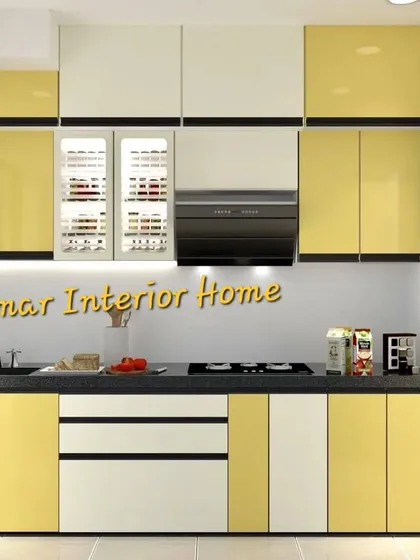 A slightly different angle of the yellow and white kitchen, highlighting the glossy finish of the acrylic shutters and the black granite countertop.