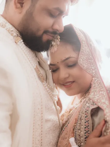 Another angle of that beautiful, tender embrace. This close-up focuses on their serene expressions and the gentle way they hold each other, a testament to their deep connection.