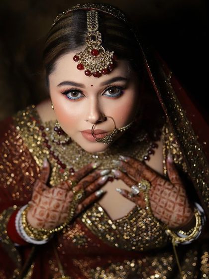 A powerful close-up of the bride. The smoky eyes and defined features create a very dramatic and beautiful look.