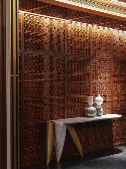 A feature on the Bammi Residence dining room, highlighting the custom Pinjirakari console table that showcases our commitment to reviving traditional Indian crafts.