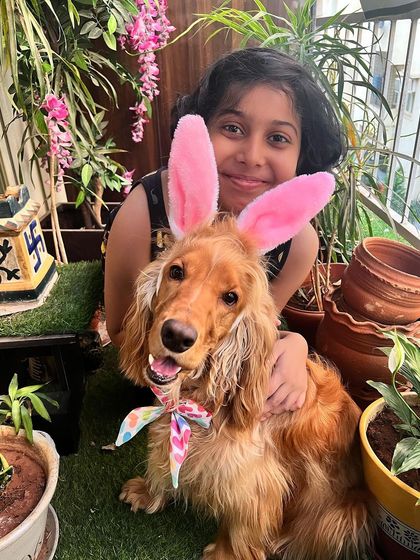All smiles for Easter! The bond between children and pets is truly special.