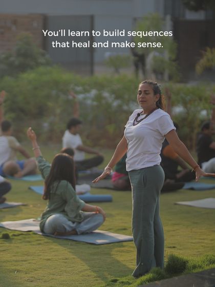 Our 300-hour yoga therapy course teaches you to build sequences that heal. Here, Neelam Mangat guides a class outdoors, focusing on mindful movement and breath to create a truly restorative experience.