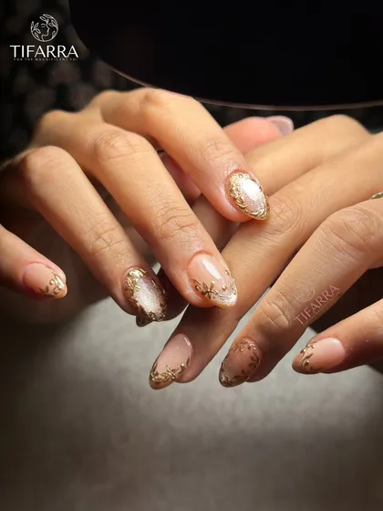 A full view of the elegant golden floral set, showing how the designs complement each other across both hands.