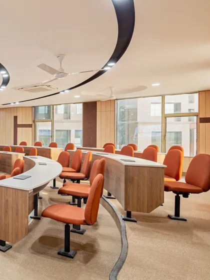 Another view of a classroom at GL Bajaj University, highlighting the tiered seating arrangement and ample natural light. The design promotes an interactive and inclusive learning atmosphere.