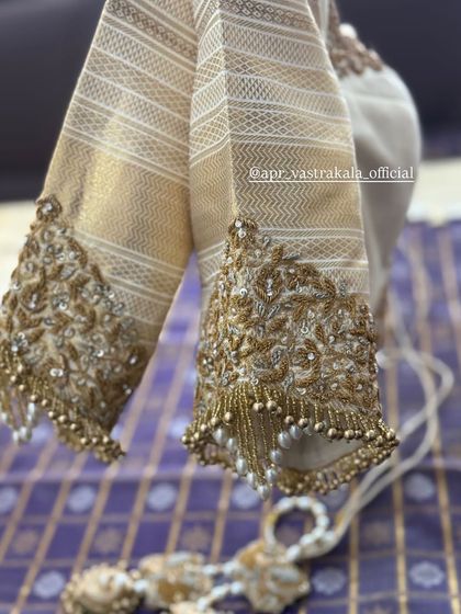 Another view of the gold embroidered sleeves.